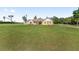 Charming single Gathering home on a spacious lawn with mature trees and attractive landscaping at 9950 Nw 11Th Ter, Ocala, FL 34475