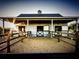 Well-maintained horse barn featuring Dutch doors, individual stalls, and paddock at 9950 Nw 11Th Ter, Ocala, FL 34475