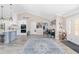 Bright and open living space with a modern kitchen, stylish furnishings, and plenty of room for entertaining at 9950 Nw 11Th Ter, Ocala, FL 34475