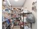 Large walk-in pantry with ample shelving for food storage at 9950 Nw 11Th Ter, Ocala, FL 34475