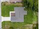 Aerial view of the house showing the roof and driveway at 12 Oak Circle Pass, Ocala, FL 34472