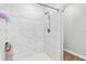 Shower with subway tile and updated shower head at 12 Oak Circle Pass, Ocala, FL 34472
