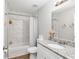 Bright bathroom with shower, vanity, and modern fixtures at 12 Oak Circle Pass, Ocala, FL 34472