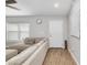 Bright living room featuring natural light, wood floors, and a neutral color palette at 12 Oak Circle Pass, Ocala, FL 34472