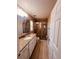 Bathroom showcasing tile flooring, granite countertops, and glass enclosed shower at 12840 Sw 60Th Ct, Ocala, FL 34473