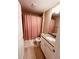Cozy bathroom with a shower-tub combo, granite countertops, and tile flooring at 12840 Sw 60Th Ct, Ocala, FL 34473