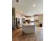 Spacious kitchen featuring an island, stainless steel appliances, and granite countertops at 12840 Sw 60Th Ct, Ocala, FL 34473