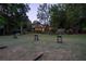 Relaxing backyard space featuring seating and a view of the property's exterior at 1450 Se 73Rd Pl, Ocala, FL 34480
