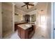 Large bathroom with double sinks, vanity island, walk-in shower, and plenty of counter space at 1450 Se 73Rd Pl, Ocala, FL 34480