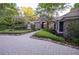 Beautifully landscaped front yard with a stone pathway leading to this elegant home at 1450 Se 73Rd Pl, Ocala, FL 34480