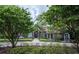 Stunning home with mature trees, manicured landscaping, and a grand entrance at 1450 Se 73Rd Pl, Ocala, FL 34480