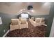 Home theater features comfortable seating, overhead projector, and a large screen at 1450 Se 73Rd Pl, Ocala, FL 34480