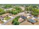 Overview of a residential area with a single-Gathering home, mature trees, and construction projects in the neighborhood at 14978 Sw 46Th Cir, Ocala, FL 34473