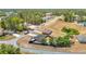 An aerial view showcases a home with fenced yard on a corner lot in a quiet residential neighborhood at 14978 Sw 46Th Cir, Ocala, FL 34473