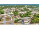 Aerial view of a well-established residential neighborhood with mature trees and green lawns at 14978 Sw 46Th Cir, Ocala, FL 34473