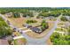 Aerial shot displaying the layout of a neighborhood with homes, trees, and roadway at 14978 Sw 46Th Cir, Ocala, FL 34473
