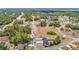 Aerial view of the neighborhood highlighting the layout, landscaping, and proximity to surrounding areas at 14978 Sw 46Th Cir, Ocala, FL 34473