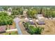 Wide aerial shot showing a home in a residential neighborhood with mature trees and new construction nearby at 14978 Sw 46Th Cir, Ocala, FL 34473