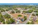 Neighborhood aerial view showing home sites, surrounding trees, and proximity to neighborhood roads at 14978 Sw 46Th Cir, Ocala, FL 34473