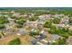 Community aerial view showing the layout of homes, roads, and green spaces within the neighborhood at 14978 Sw 46Th Cir, Ocala, FL 34473
