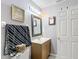 Bathroom featuring a vanity with storage, stylish decor, and neutral colored walls at 14978 Sw 46Th Cir, Ocala, FL 34473