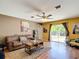 Cozy living room with ample natural light, comfortable seating, and stylish decor at 14978 Sw 46Th Cir, Ocala, FL 34473