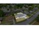 An aerial view of the home shows its layout and a fenced backyard at 15044 Sw 35Th Avenue Rd, Ocala, FL 34473