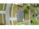 Aerial view showcasing backyard with circular trampoline, neighborhood roads, and backyard with grass at 15044 Sw 35Th Avenue Rd, Ocala, FL 34473