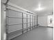 Spacious two car garage that leads into the kitchen area in the house at 15044 Sw 35Th Avenue Rd, Ocala, FL 34473