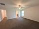 Spacious main bedroom features a ceiling fan, walk-in closet, and an ensuite bathroom at 15317 Sw 65Th Terrace Rd, Ocala, FL 34473