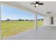 Spacious lanai with pillars offers unobstructed views of the expansive, lush green lawn at 1784 Nw 85Th Loop, Ocala, FL 34475