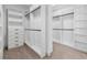 Spacious walk-in closet with custom shelving and drawers for optimal storage at 1784 Nw 85Th Loop, Ocala, FL 34475