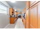 Bright eat-in kitchen features oak cabinets, tile floors, a gas range, and stainless steel appliances at 18027 Se 90Th St, Ocklawaha, FL 32179