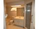 Neutral bathroom features a shower, vanity, toilet, and built-in bathtub at 20364 Sw 86Th Loop, Dunnellon, FL 34431