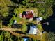 Birds-eye-view of lakefront houses with docks and lush surroundings at 23800 Ne 190Th St, Fort Mc Coy, FL 32134