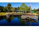 Waterfront home with private dock, pontoon boat, American flag and lake access at 23800 Ne 190Th St, Fort Mc Coy, FL 32134