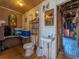 Cozy bathroom with toilet, sink, storage shelves and access to garage at 23800 Ne 190Th St, Fort Mc Coy, FL 32134