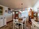 Charming dining area featuring natural light, tile flooring, and built in storage at 23800 Ne 190Th St, Fort Mc Coy, FL 32134