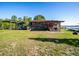 Quaint rustic home with parking, outdoor space and a lake view at 23800 Ne 190Th St, Fort Mc Coy, FL 32134