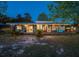 Charming waterfront home with cozy front porch and picturesque lake views at 23800 Ne 190Th St, Fort Mc Coy, FL 32134