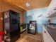 Functional kitchen with black appliances and ample storage at 23800 Ne 190Th St, Fort Mc Coy, FL 32134