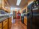 Well-lit kitchen with ample cabinet space and modern appliances at 23800 Ne 190Th St, Fort Mc Coy, FL 32134