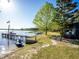 Picturesque waterfront property with a private dock, lake access, and cozy home exterior at 23800 Ne 190Th St, Fort Mc Coy, FL 32134