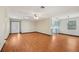 Inviting living area featuring laminate floors, a neutral color palette, and an open layout perfect for modern living at 28 Gordon Ct, Leesburg, FL 34788