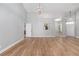 Spacious living area with hardwood floors and stylish chandelier at 2935 Sw 41St Pl, Ocala, FL 34474