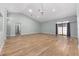 Expansive living room with vaulted ceilings and wood-look floors at 2935 Sw 41St Pl, Ocala, FL 34474
