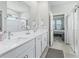 Bathroom with double sink vanity, modern fixtures, and a separate shower at 3840 Se 6Th Ave, Ocala, FL 34480