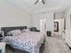 Relaxing bedroom with a king bed, soft lighting, and generous layout at 3840 Se 6Th Ave, Ocala, FL 34480