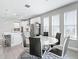 A sleek dining area complements the kitchen, offering a modern living space at 3840 Se 6Th Ave, Ocala, FL 34480