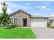 Charming one-story home featuring a stone facade and well-maintained landscaping at 3840 Se 6Th Ave, Ocala, FL 34480